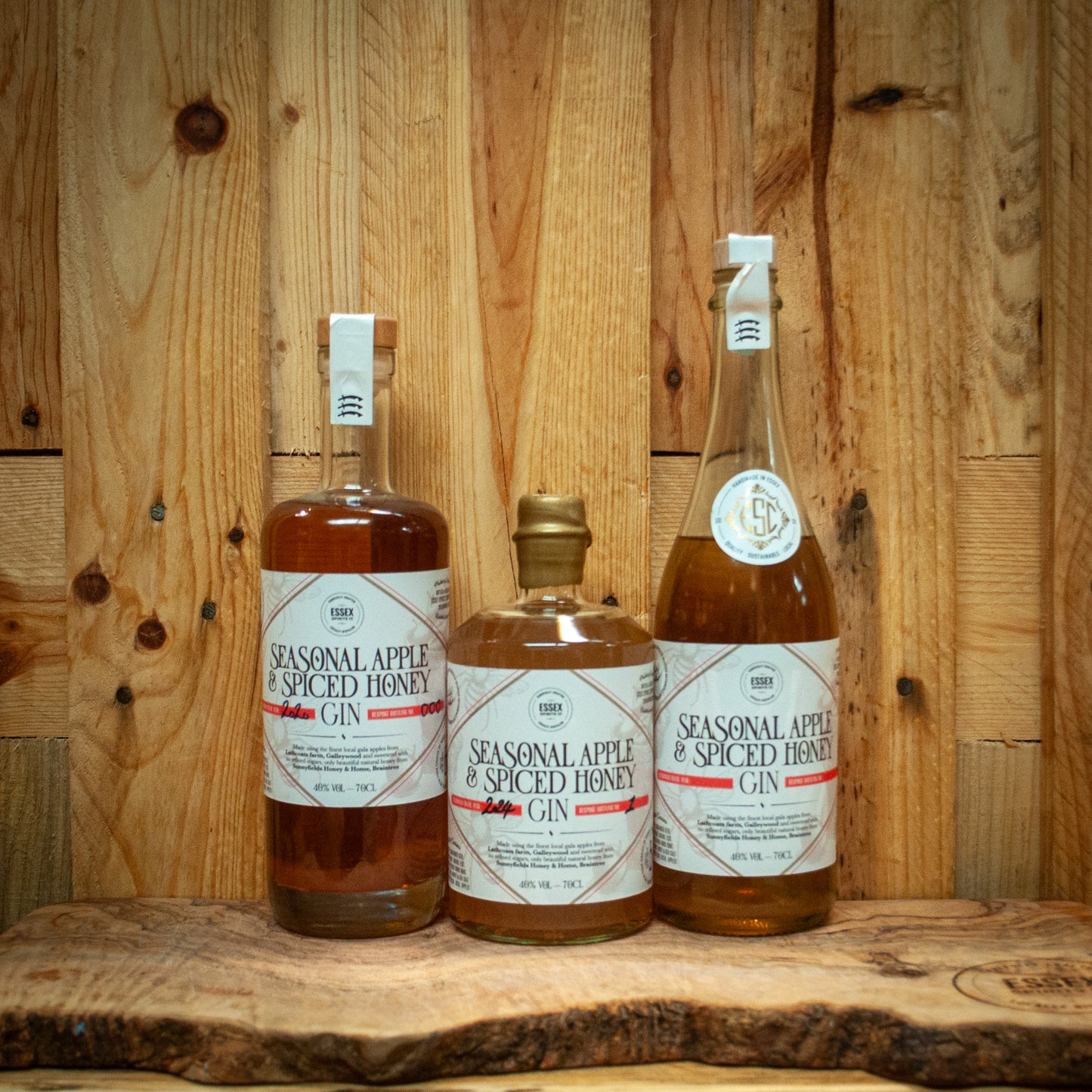 The evolution of the bottle of the Seasonal Apple & Spiced Honey Gin from Essex Spirits Company, Chelmsford Distillery